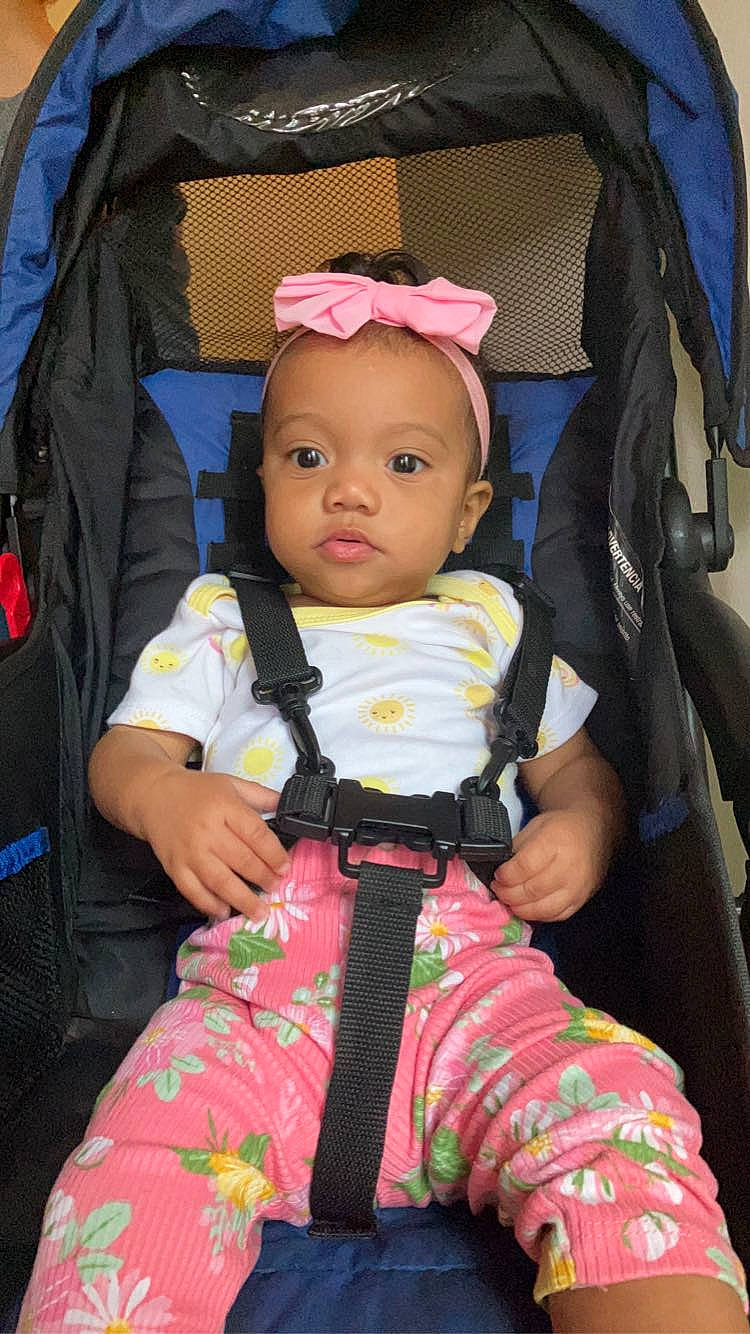 Jessica joined the competition — help win amazing prizes! baby, baby_carriage, baby_products, baby_safety, baby_toddler_clothing, bag, cheek, child, comfort, fun, pattern, person, pink, product, sitting, sleeve, toddler, vacation