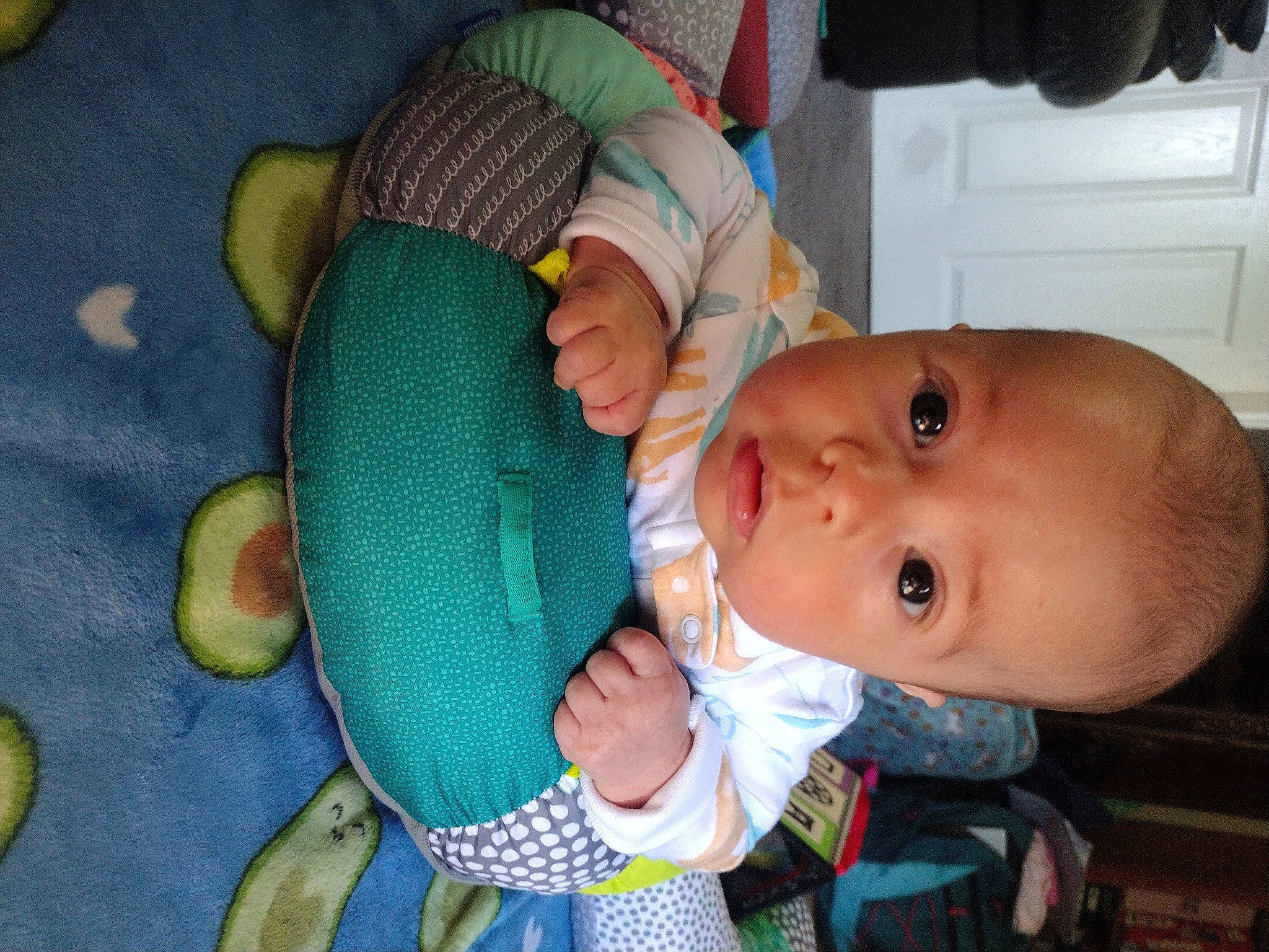 George joined the competition — help win amazing prizes! baby, baby_products, baby_safety, baby_toddler_clothing, cheek, child, comfort, eye, face, finger, iris, mammal, mouth, nose, person, product, room, sitting, skin, toddler