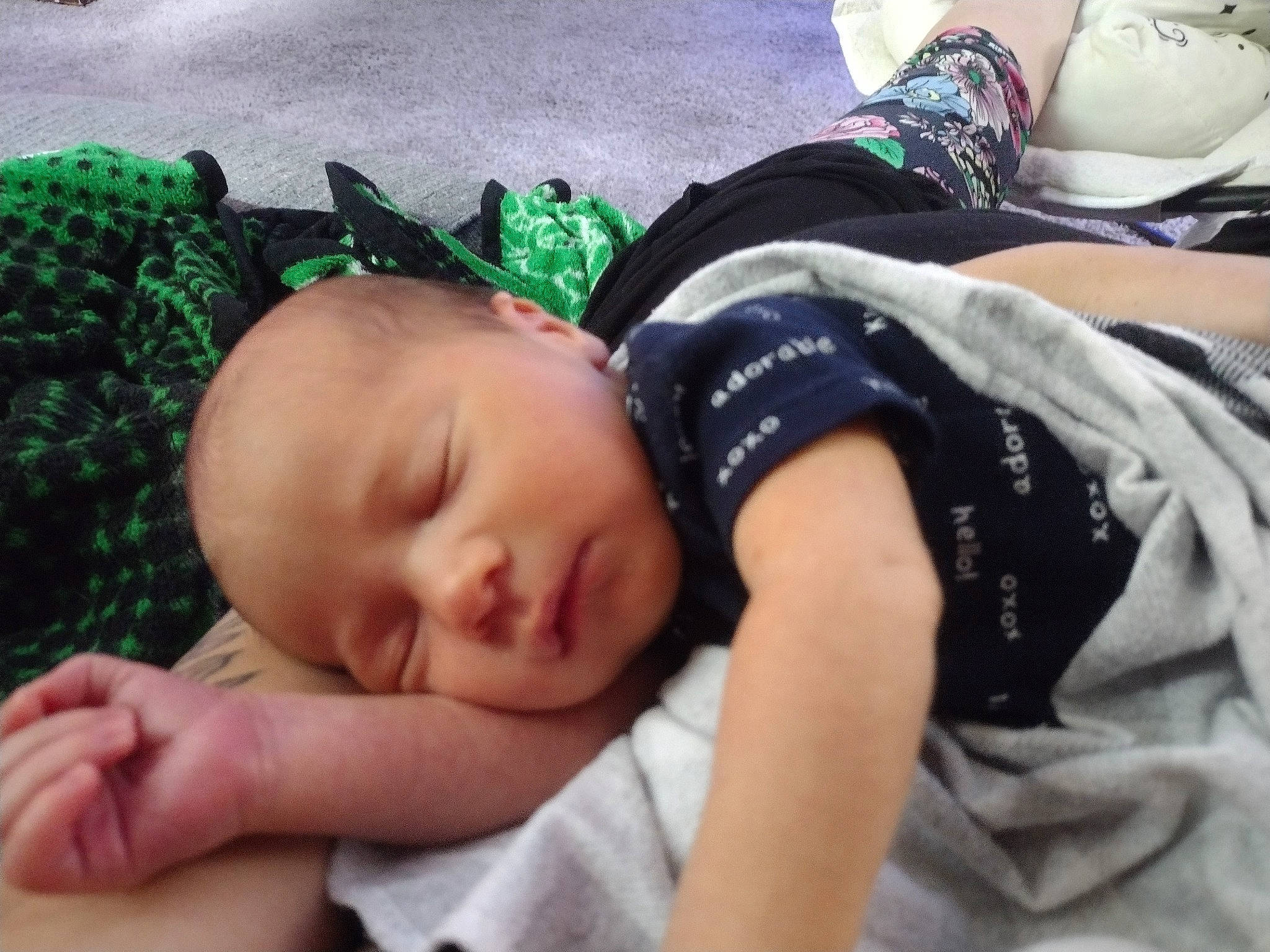 George is registered to the contest to win money with this photo: baby, baby_toddler_clothing, bedtime, cheek, child, comfort, grass, green, headgear, linens, mouth, nap, pattern, person, room, sitting, skin, sleep, thumb, toddler