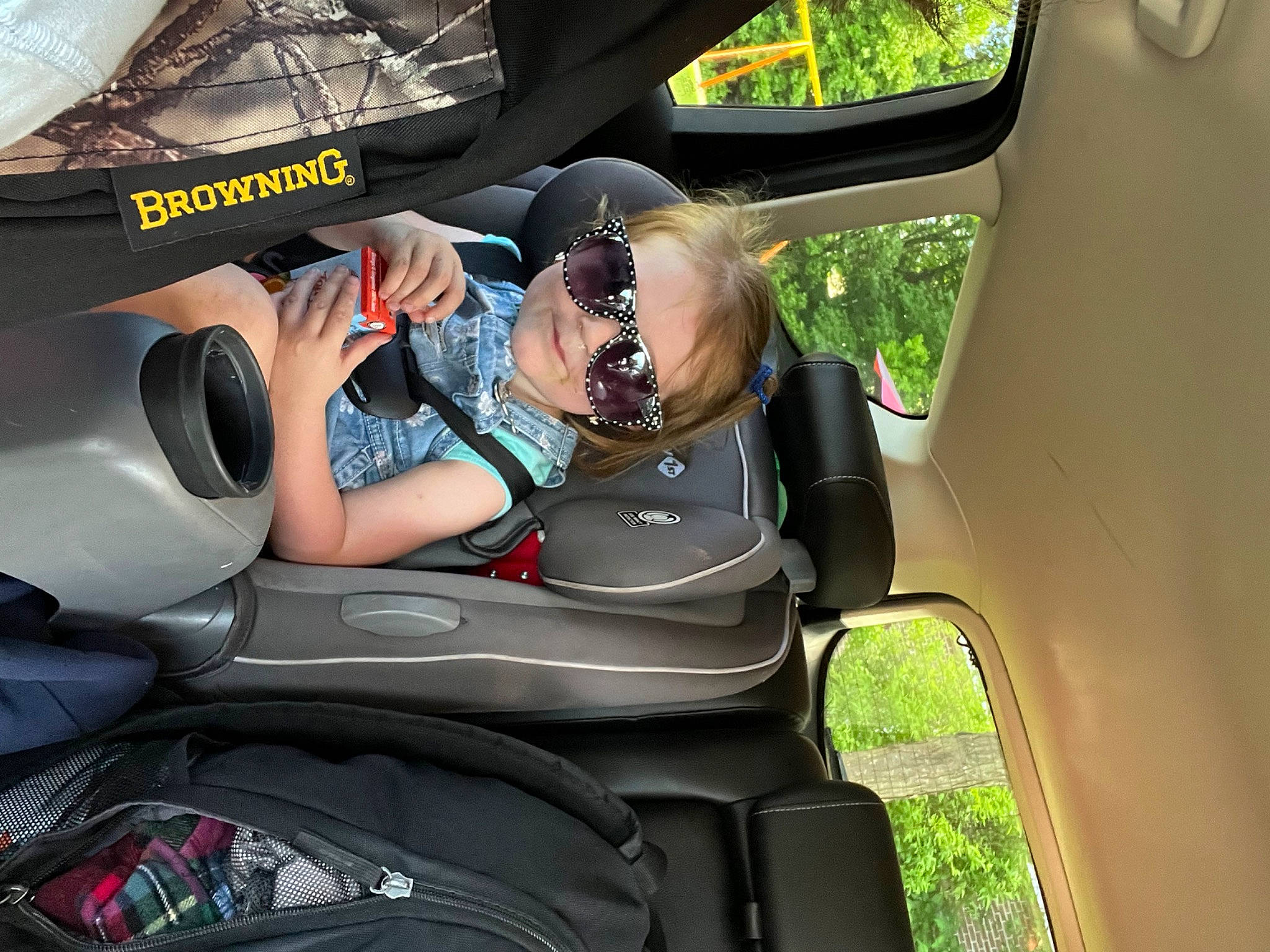 Ashlyn is registered to the contest to win money with this photo: auto_part, automotive_design, automotive_exterior, automotive_tire, car, car_seat, car_seat_cover, head_restraint, mode_of_transport, motor_vehicle, person, personal_luxury_car, personal_protective_equipment, plant, seat_belt, steering_part, steering_wheel, sunglasses, vehicle, vehicle_door