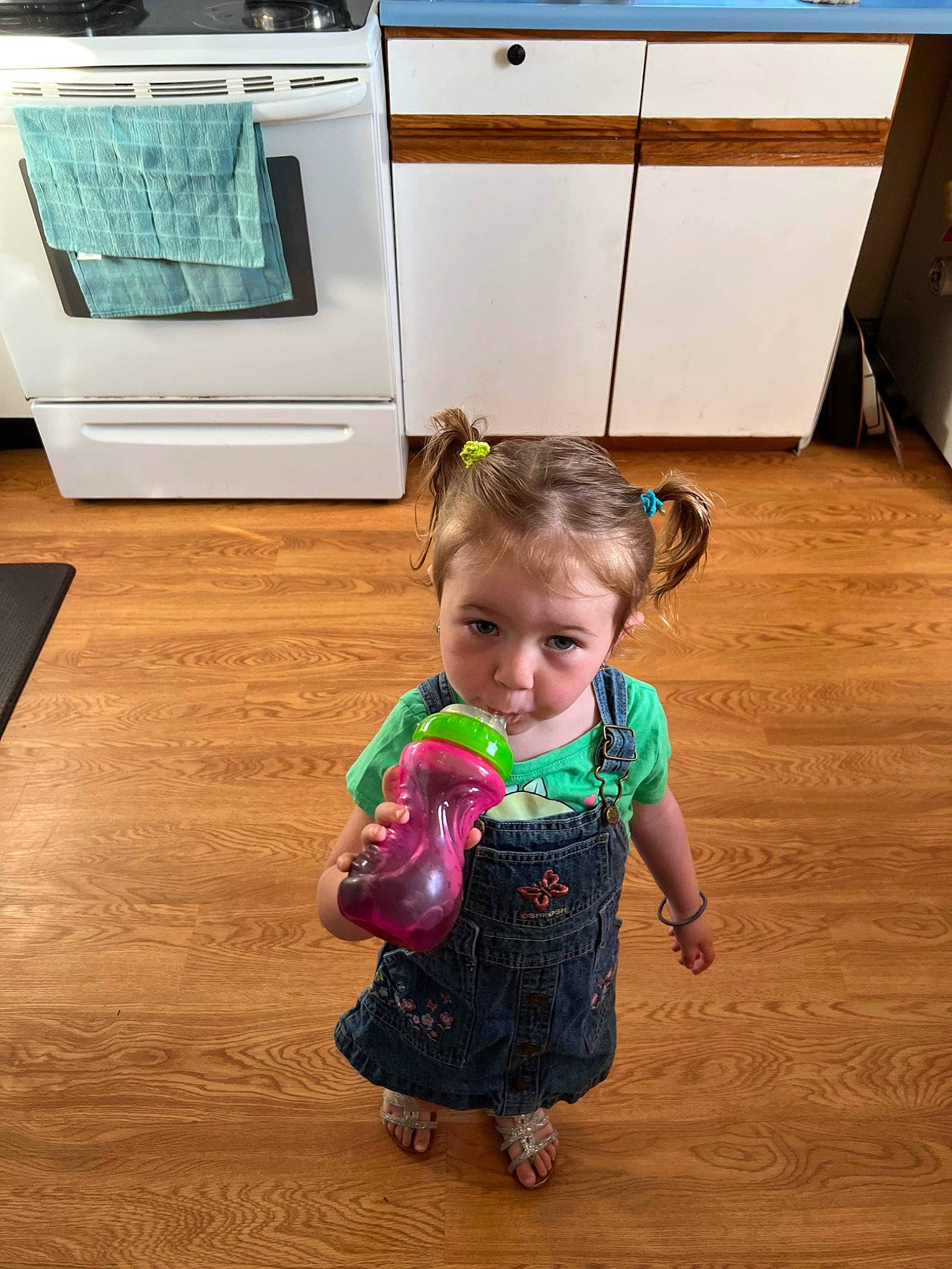 Ashlyn joined the competition — help win amazing prizes! baby_toddler_clothing, beauty, cabinetry, chest_of_drawers, child, drawer, floor, flooring, fun, happy, hardwood, home_appliance, laminate_flooring, pattern, person, room, standing, toddler, varnish, wood