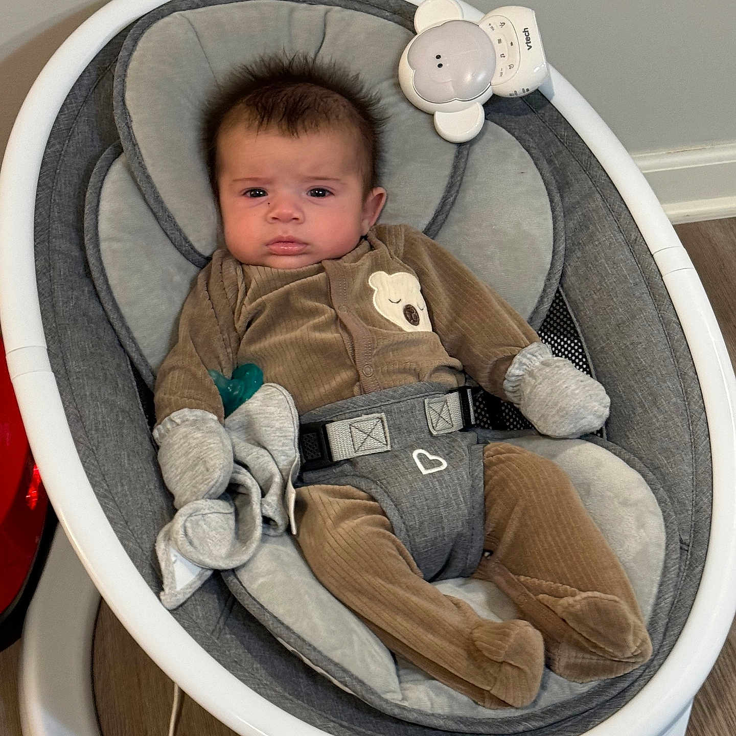 Keam joined the competition — help win amazing prizes! baby, baby_boy, baby_rocker, baby_seat, baby_toy, brown_pajamas, child, clothing, comfort, cute, expression, face, floor, home, indoor, infant, mittens, modern, pacifier, wooden_floor
