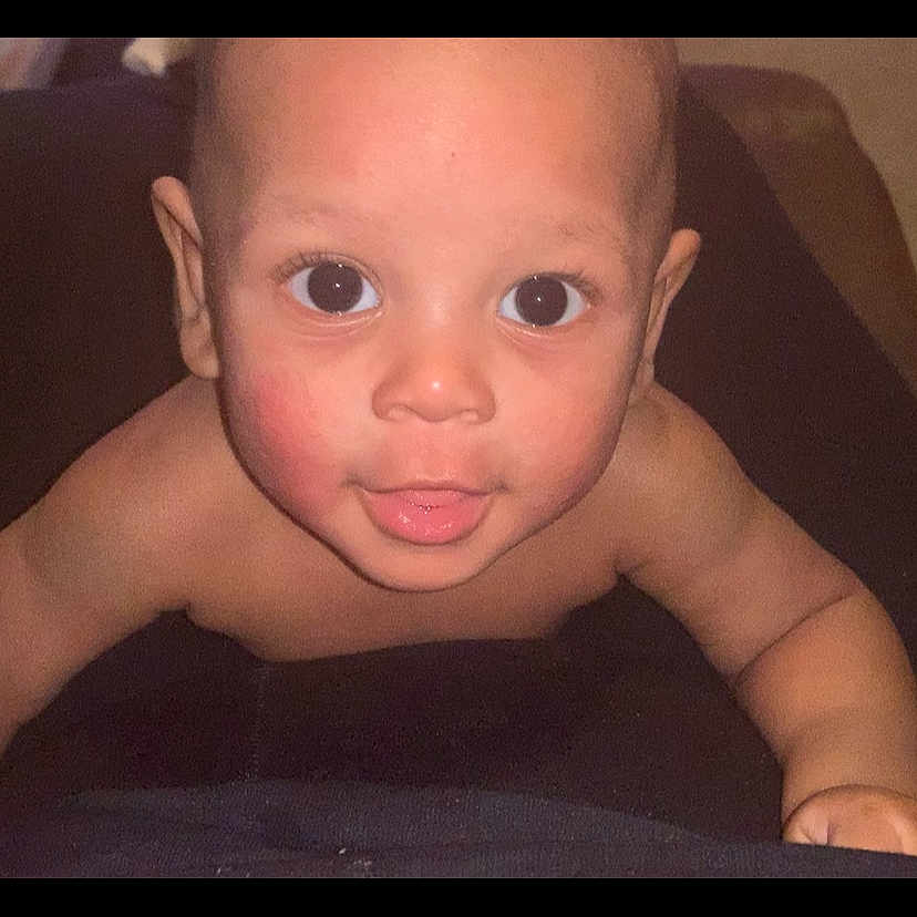 Maeast is registered to the contest to win money with this photo: baby, child, face, eyes, curious, expression, skin, head, portrait, infant, cute, young, person, closeup, looking, indoors, playful, small, human, baby_skin