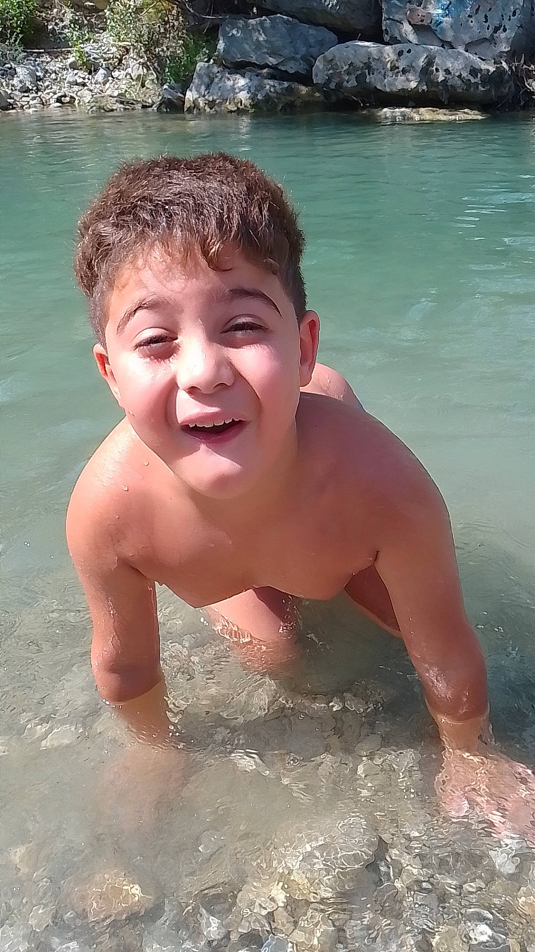 Elyess a rejoint le concours — aidez-le/la à gagner de superbes lots ! arm, barechested, bathing, beach, chest, eye, fun, hair, happy, head, human_body, jaw, leisure, muscle, people_on_beach, person, recreation, smile, summer, trunk