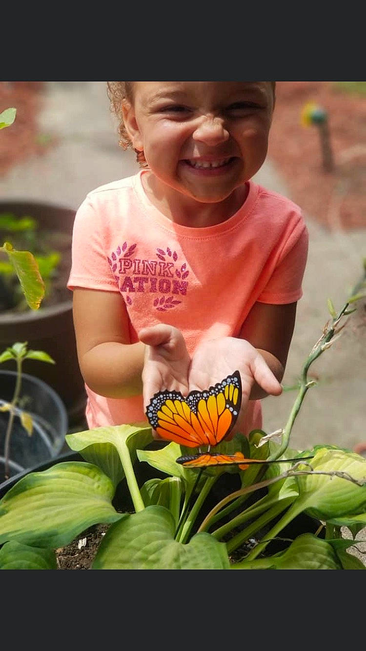 Addlynn joined the competition — help win amazing prizes! adaptation, botany, butterfly, child, flower, headwear, joy, person, plant, smile, toddler