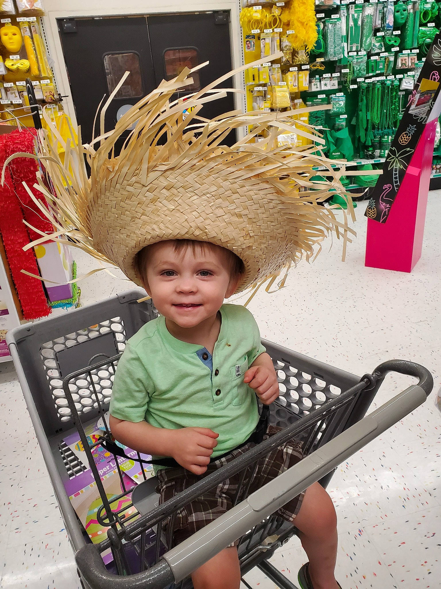 Owen is registered to the contest to win money with this photo: cart, child, fashion_accessory, fun, hat, headgear, headwear, joy, person, photography, toddler, vacation