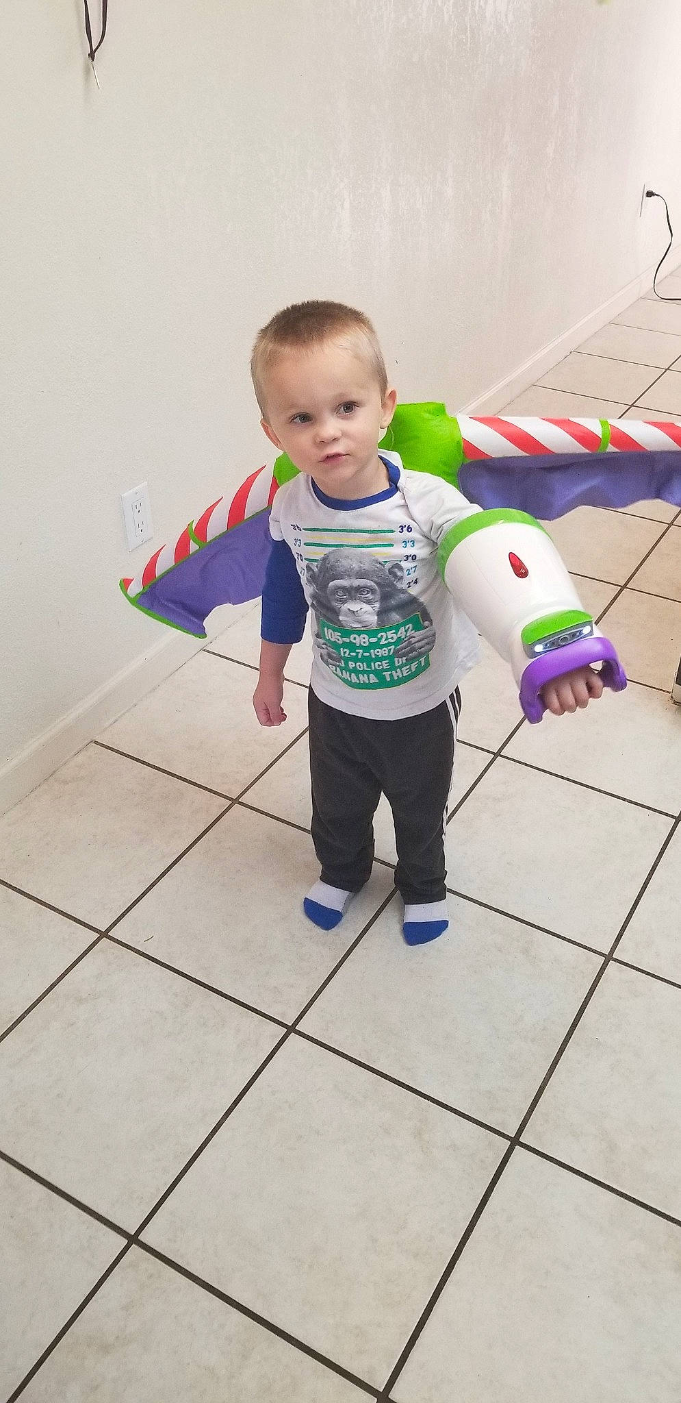 Owen is registered to the contest to win money with this photo: baby, child, floor, flooring, person, play, tile, toddler