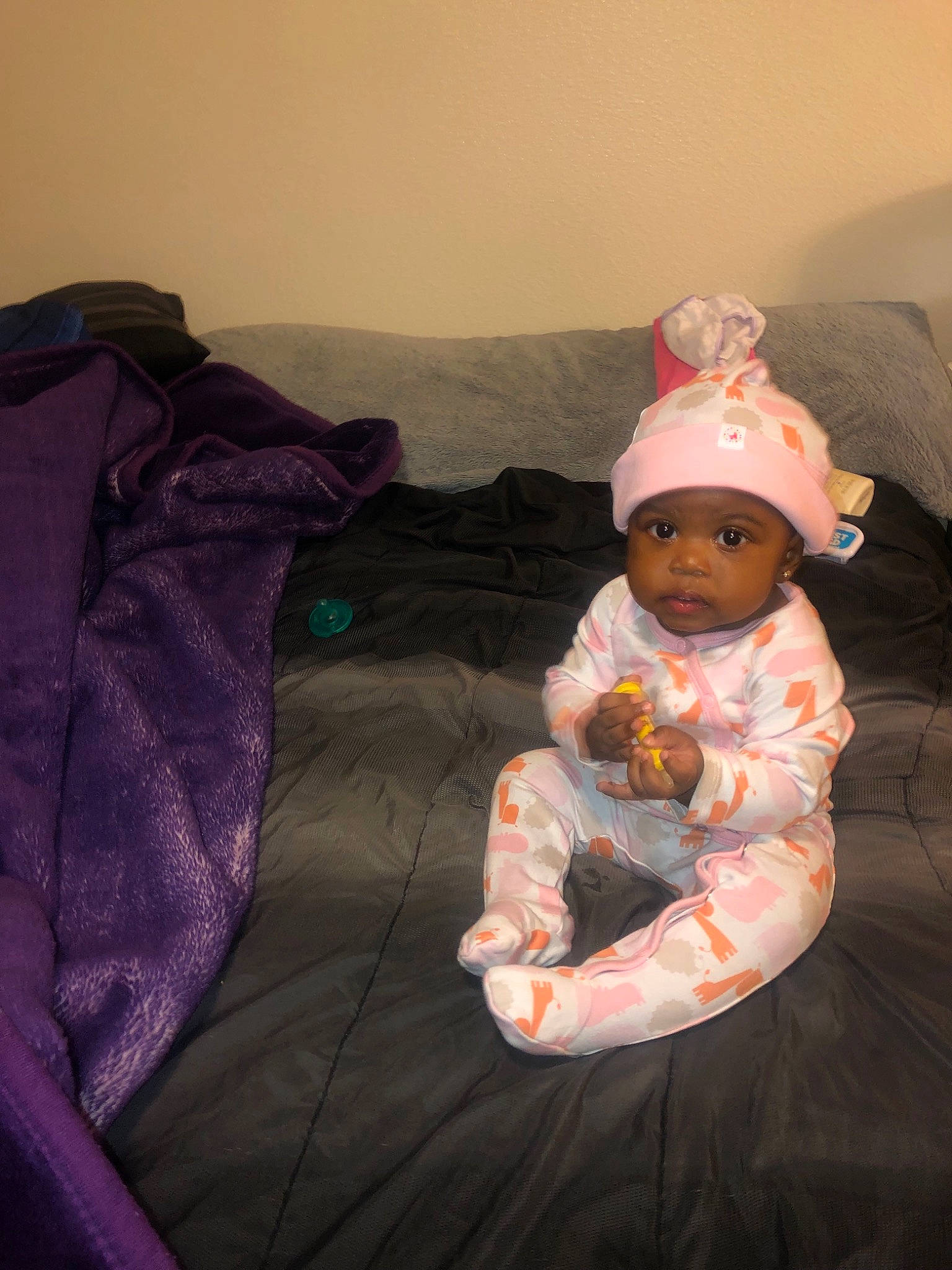 Janelle is registered to the contest to win money with this photo: baby, child, headwear, person, pink, toddler