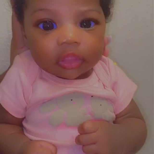 Lauryn is registered to the contest to win money with this photo: baby, baby_toddler_clothing, cheek, child, eye, face, forehead, hair, hair_accessory, head, iris, lip, pink, play, skin, smile, toddler, toy