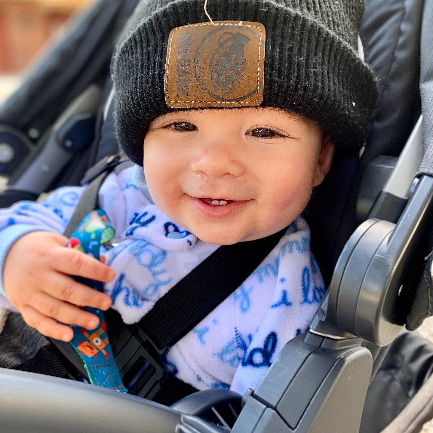 Zayn is registered to the contest to win money with this photo: auto_part, baby, baby_carriage, baby_in_car_seat, baby_products, beanie, cap, car, car_seat, child, family_car, headgear, joy, person, product, seat_belt, smile, toddler, vehicle