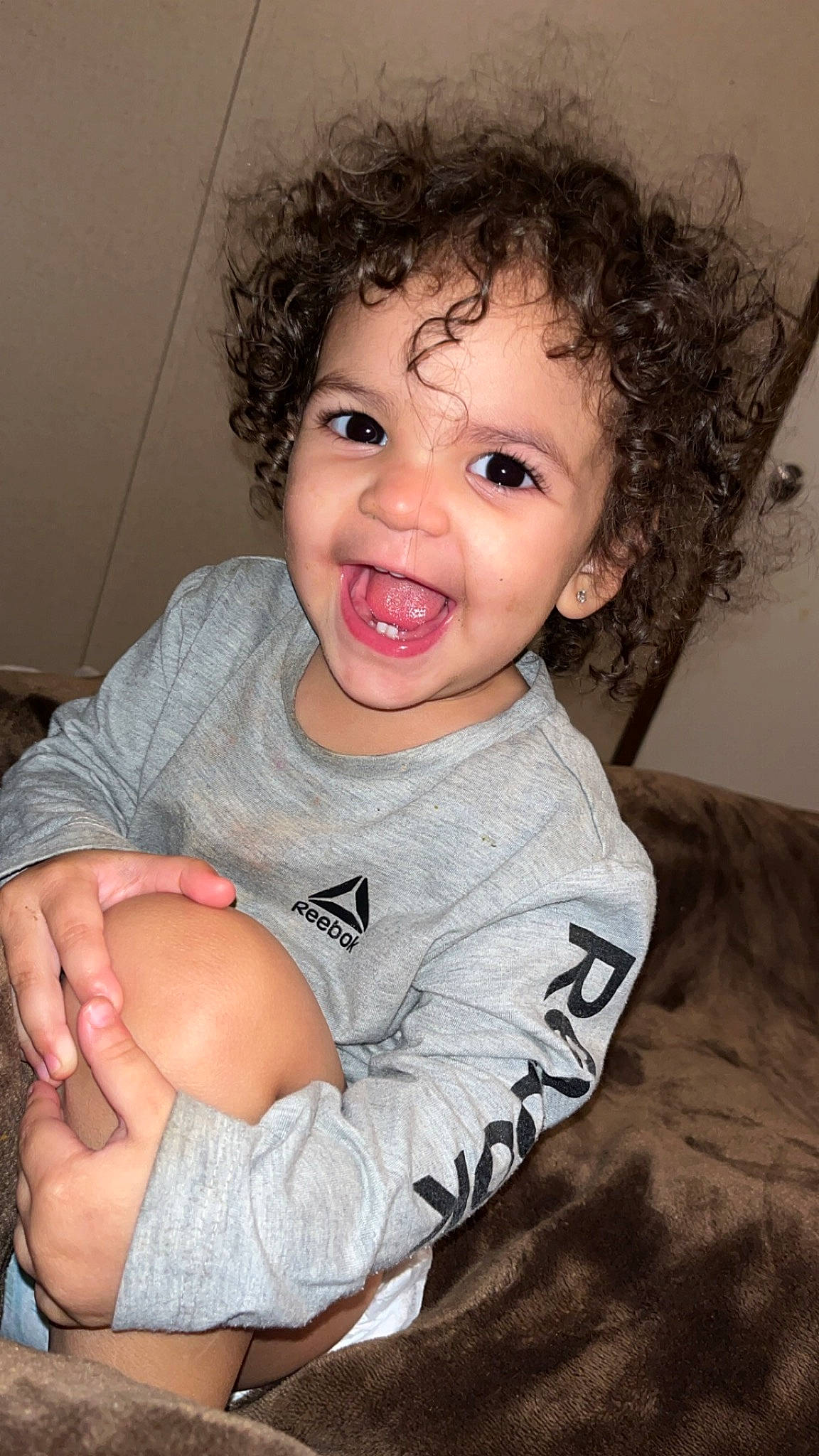 Greycyn is registered to the contest to win money with this photo: arm, cheek, chin, eye, eyelash, flash_photography, hair, hand, head, human_body, joint, lip, mouth, neck, nose, person, shoulder, skin, sleeve, smile