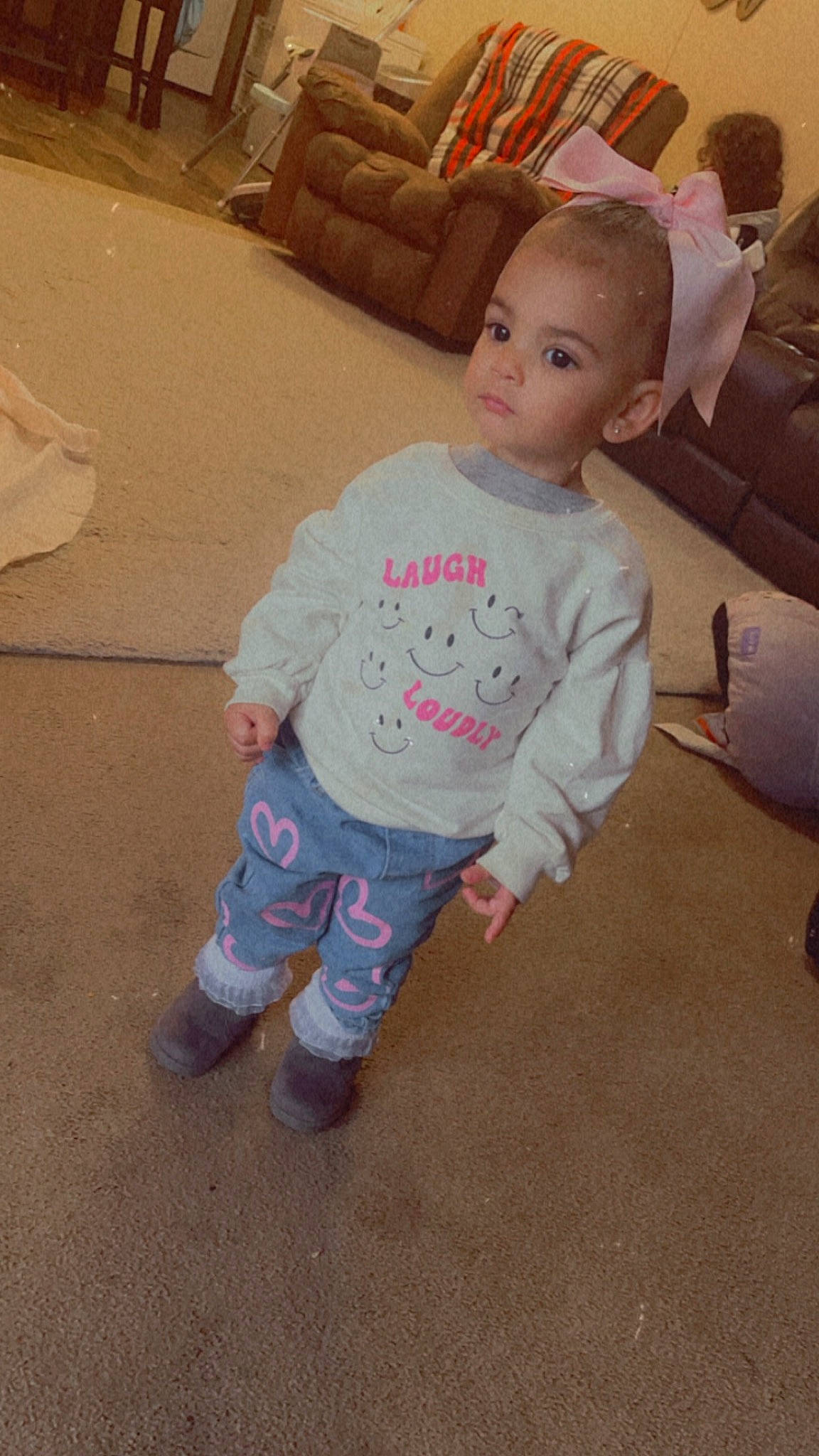 Greycyn is registered to the contest to win money with this photo: baby, baby_toddler_clothing, cheek, child, comfort, couch, floor, flooring, fun, hair, hardwood, head, nose, person, room, sitting, skin, sleeve, t_shirt, toddler