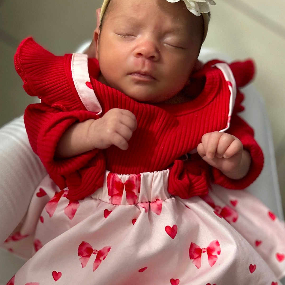 Adelaida joined the competition — help win amazing prizes! baby, bows, closeup, cute, flower, hands, headband, hearts, indoor, infant, newborn, person, pink_skirt, portrait, red_dress, sleeping, socks, soft_light, toddler, white_socks
