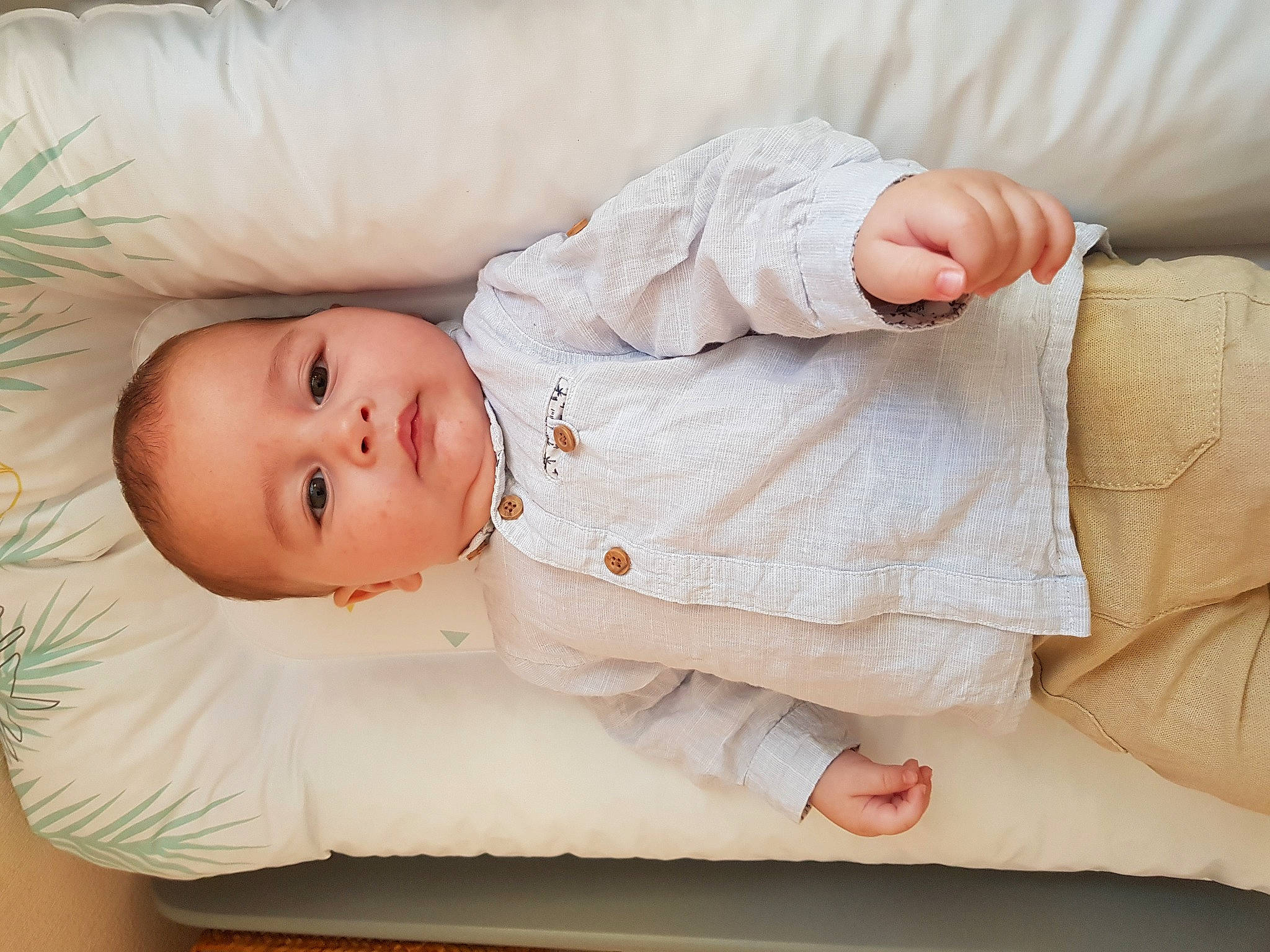 Stélios participe au concours pour gagner de l'argent avec cette photo : arm, baby, baby_toddler_clothing, child, collar, comfort, couch, dress, eye, eyelash, facial_expression, finger, happy, human_body, linens, person, product, skin, sleeve, textile