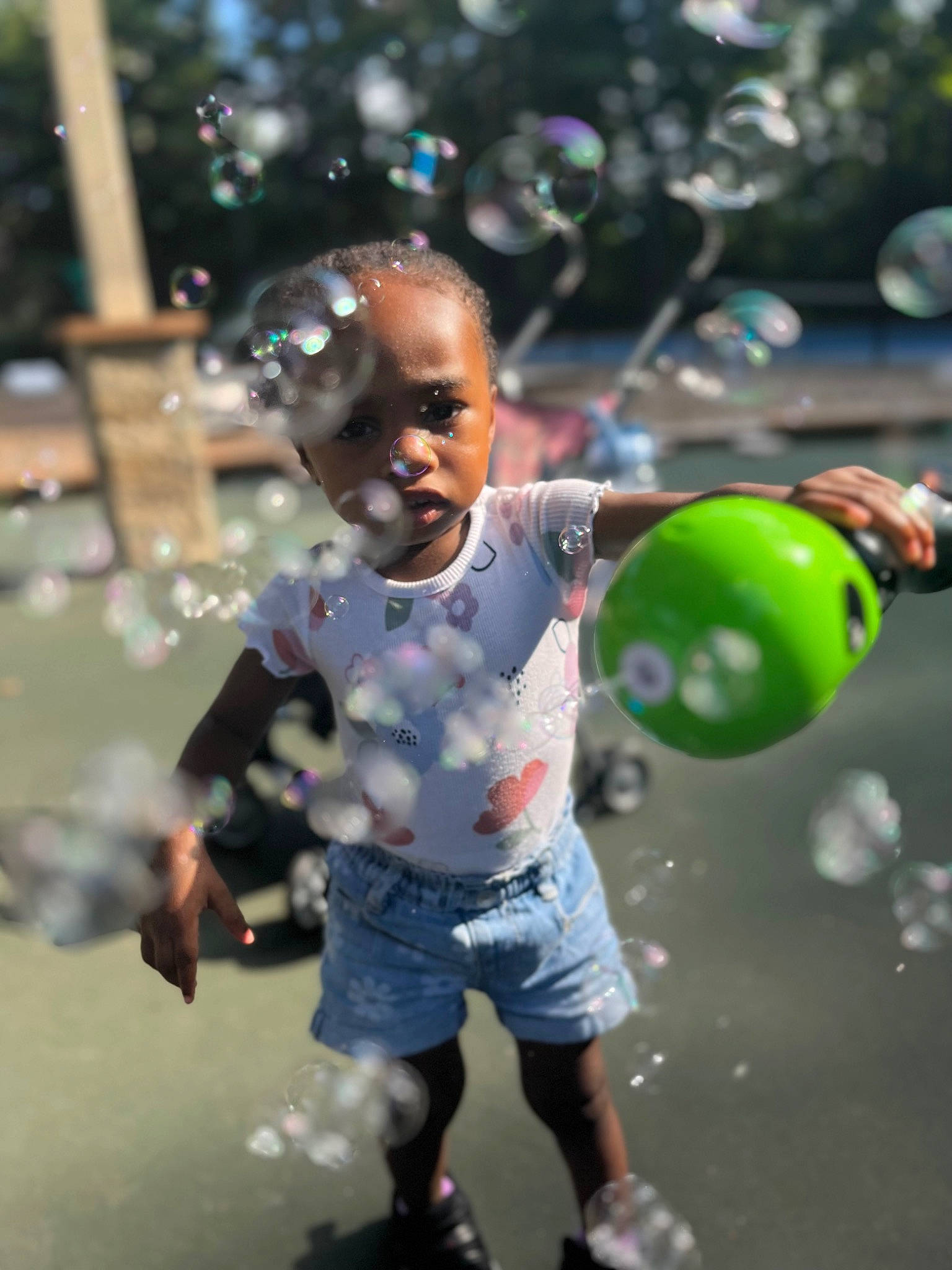 Nina joined the competition — help win amazing prizes! ball, child, city, cool, flash_photography, fun, glass, grass, happy, leisure, liquid_bubble, person, play, public_space, recreation, shorts, standing, t_shirt, toddler, water