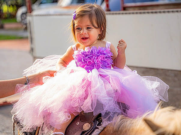 Sophia joined the competition — help win amazing prizes! ballet_tutu, bridal_clothing, bridal_party_dress, child, dance, dress, entertainment, event, formal_wear, fun, gown, happy, headpiece, magenta, person, pink, purple, ruffle, smile, toddler