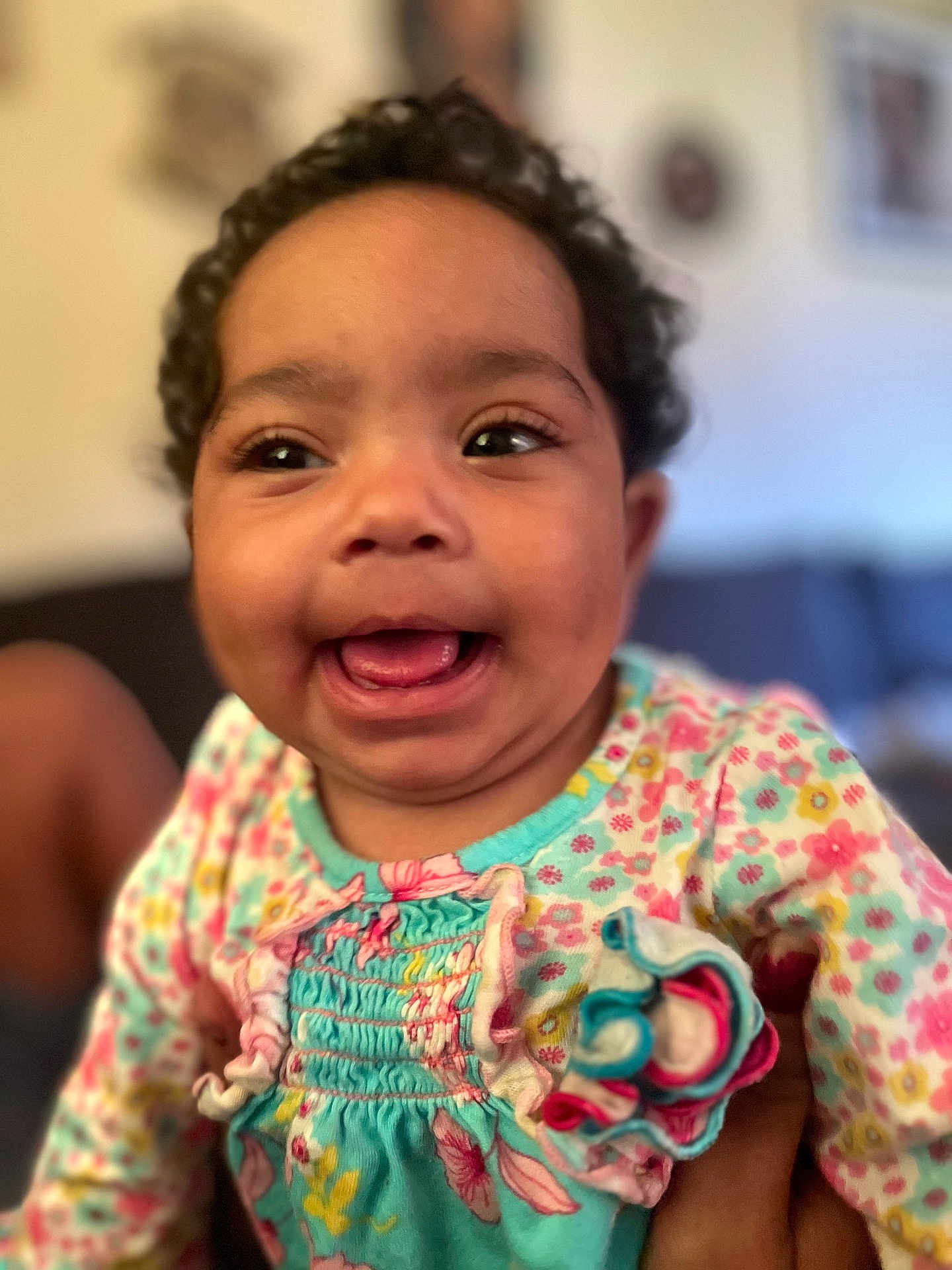 Mellissia joined the competition — help win amazing prizes! baby, child, smiling, curly_hair, floral_dress, colorful_clothing, happy, portrait, indoor, person, cute, closeup, infant, ruffles, playful, young_child, skin, face, eyes, mouth