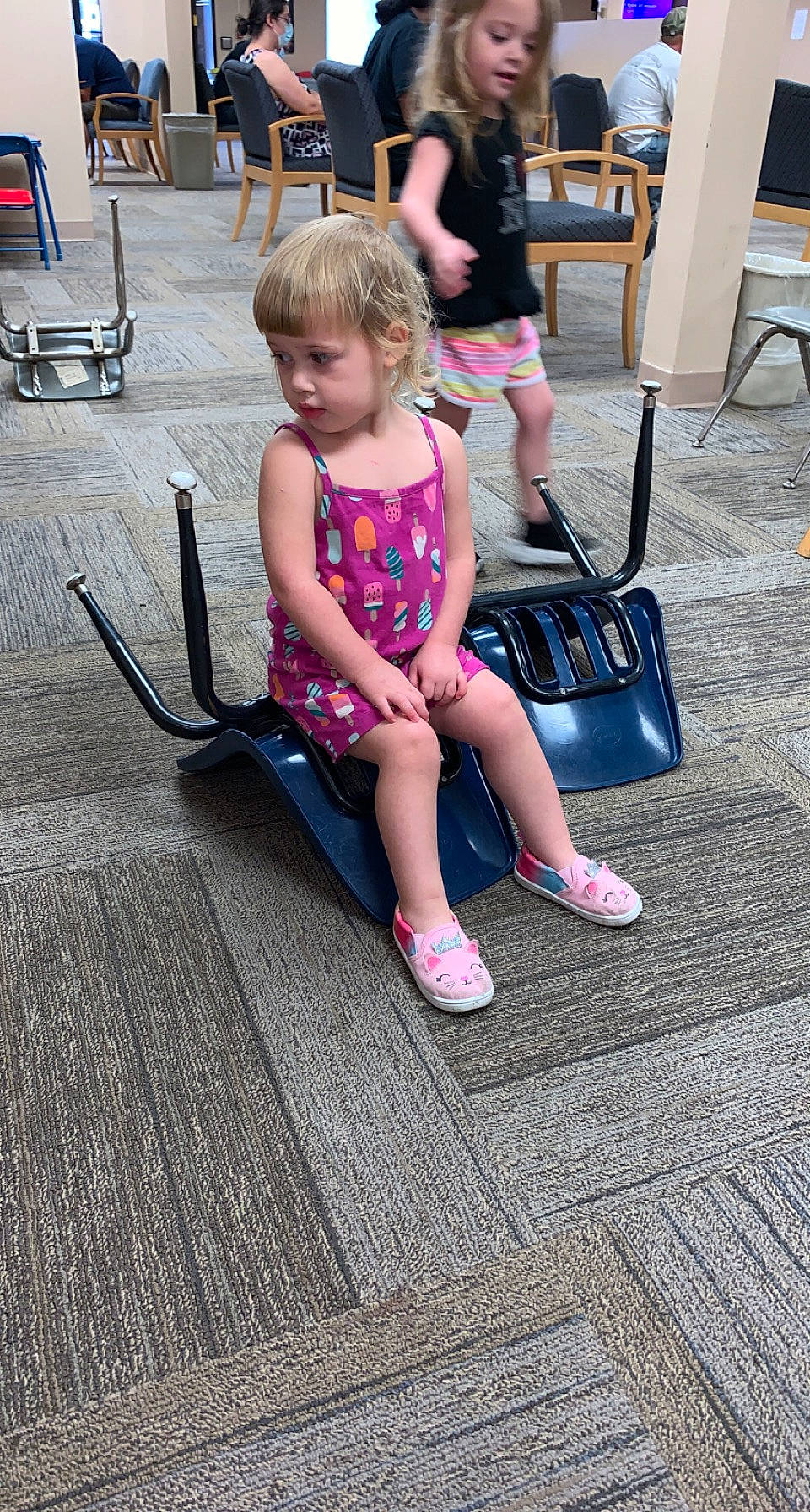 Xavianna is registered to the contest to win money with this photo: chair, child, clothing, fun, hairstyle, human_body, human_leg, joint, lap, leg, leisure, magenta, person, photograph, pink, shoe, snapshot, sneakers, standing, summer