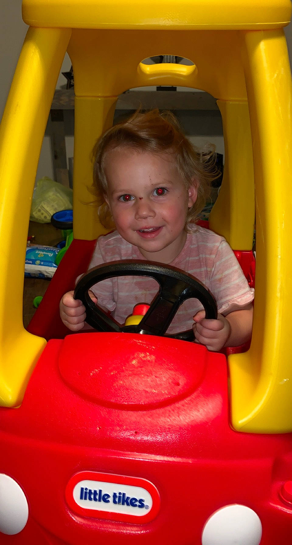 Xavianna joined the competition — help win amazing prizes! child, clothing, face, facial_expression, fun, joy, leisure, motor_vehicle, person, playground, product, public_space, recreation, red, riding_toy, skin, smile, standing, summer, tire