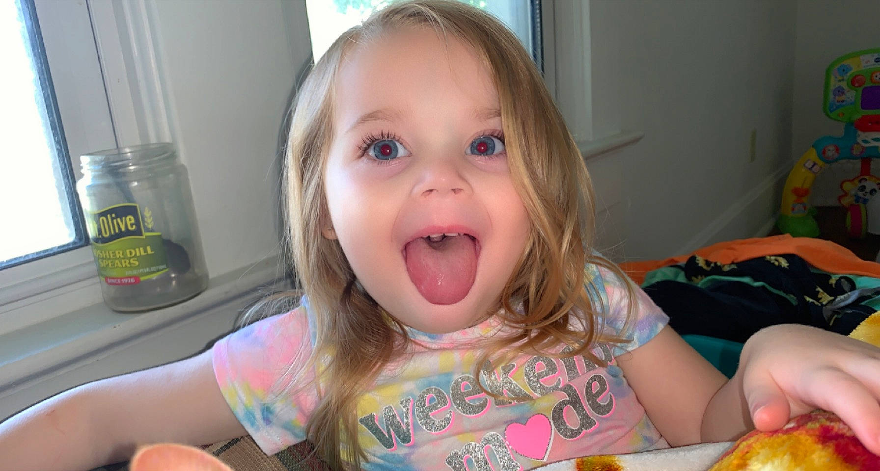 Desiree is registered to the contest to win money with this photo: baby, cheek, child, eyelash, face, facial_expression, finger, food, food_craving, fun, happy, iris, lip, mouth, nose, person, skin, smile, tableware, toddler