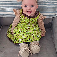 Sophia joined the competition — help win amazing prizes! baby, blanket, blue_eyes, bow, child, couch, cozy, cute, dress, floral_pattern, happy, headband, indoor, infant, knitted_booties, long_sleeves, portrait, sitting, smiling, striped