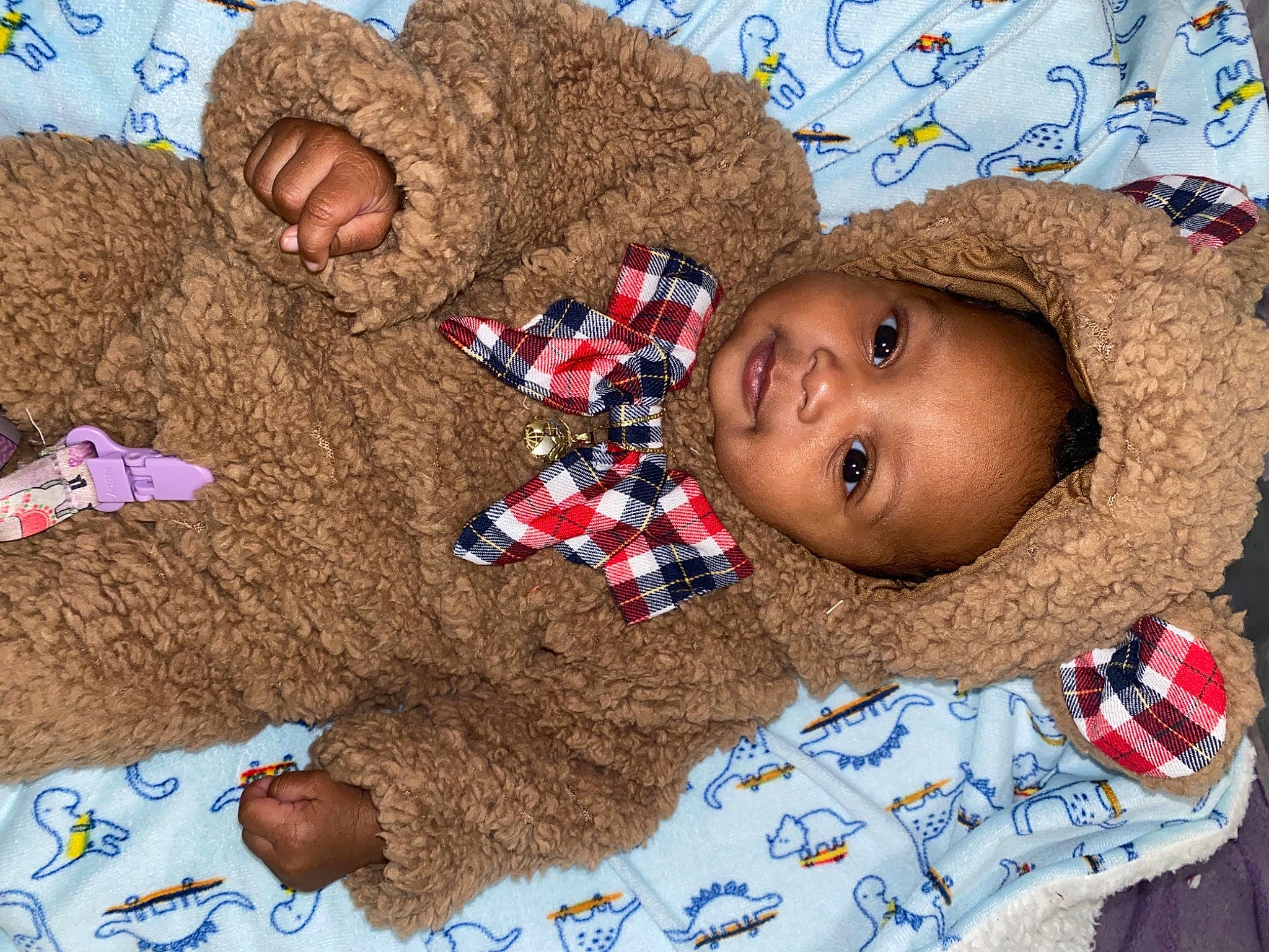 Kailyn is registered to the contest to win money with this photo: adaptation, baby, child, community, fun, happy, hat, human, linens, pattern, people_in_nature, person, play, red, sand, smile, soil, textile, toddler, toy