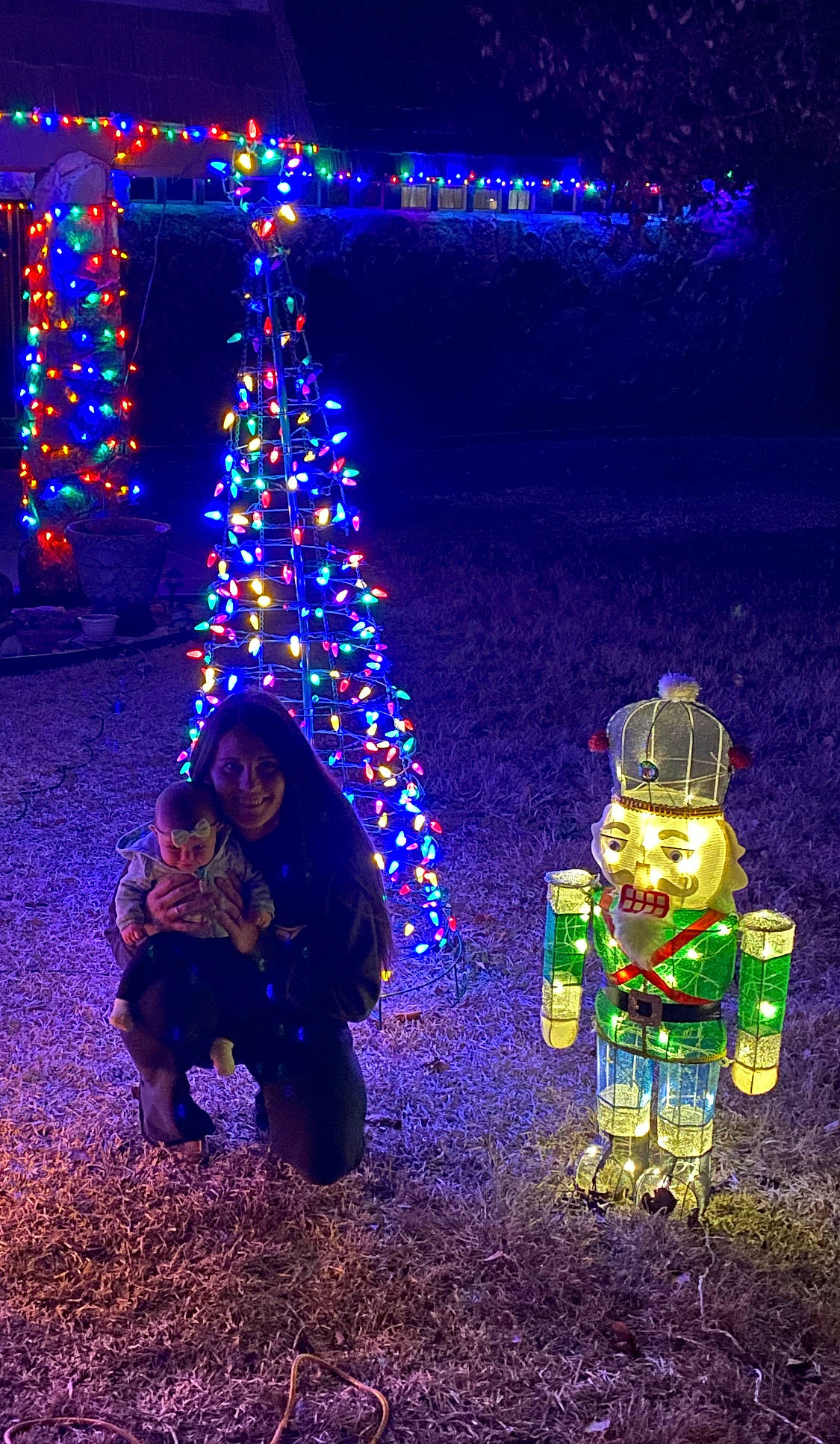 Madalynn joined the competition — help win amazing prizes! blue, christmas, christmas_decoration, christmas_eve, christmas_lights, christmas_ornament, christmas_tree, conifer, darkness, electric_blue, event, fun, holiday, interior_design, joy, light, ornament, person, plant, purple