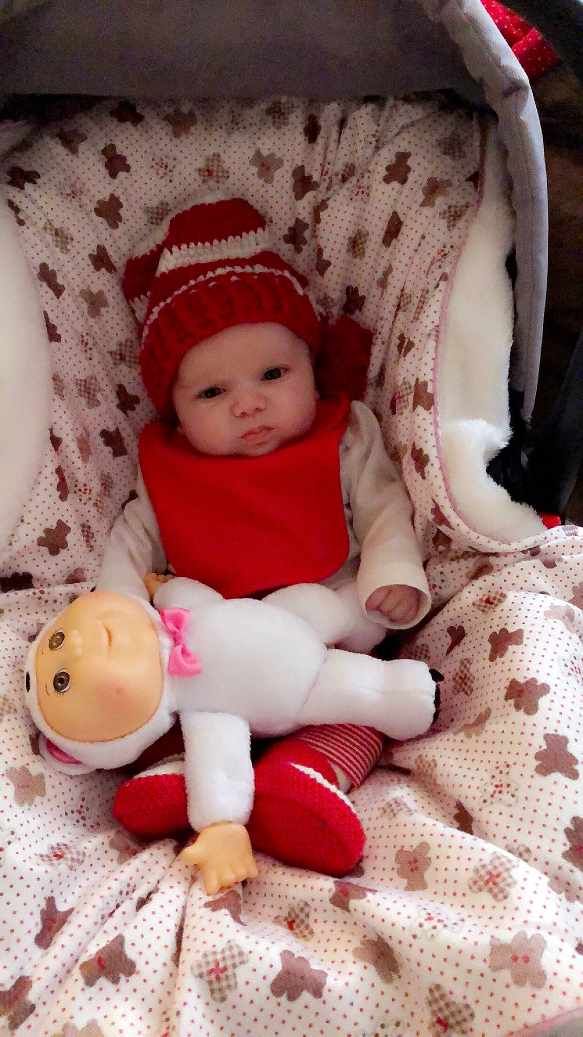 Christine is registered to the contest to win money with this photo: child, doll, girl, infant, person, pink, product, red, skin, stuffed_toy, textile, toddler, toy