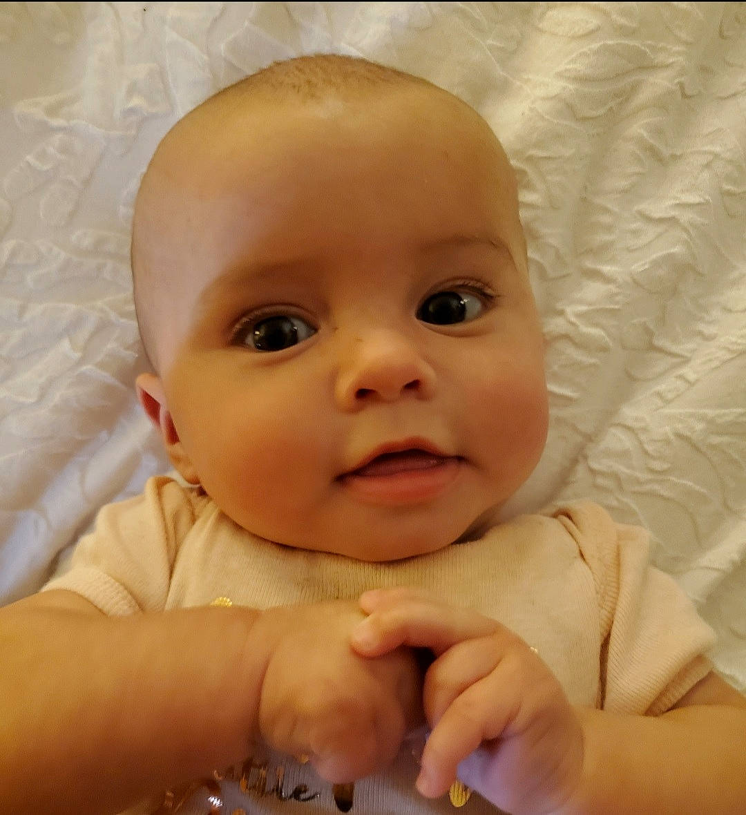 Daytona Rose is registered to the contest to win money with this photo: baby, baby_toddler_clothing, cheek, comfort, eye, eyebrow, eyelash, finger, gesture, happy, head, iris, lip, mouth, nail, nose, person, skin, smile, thumb