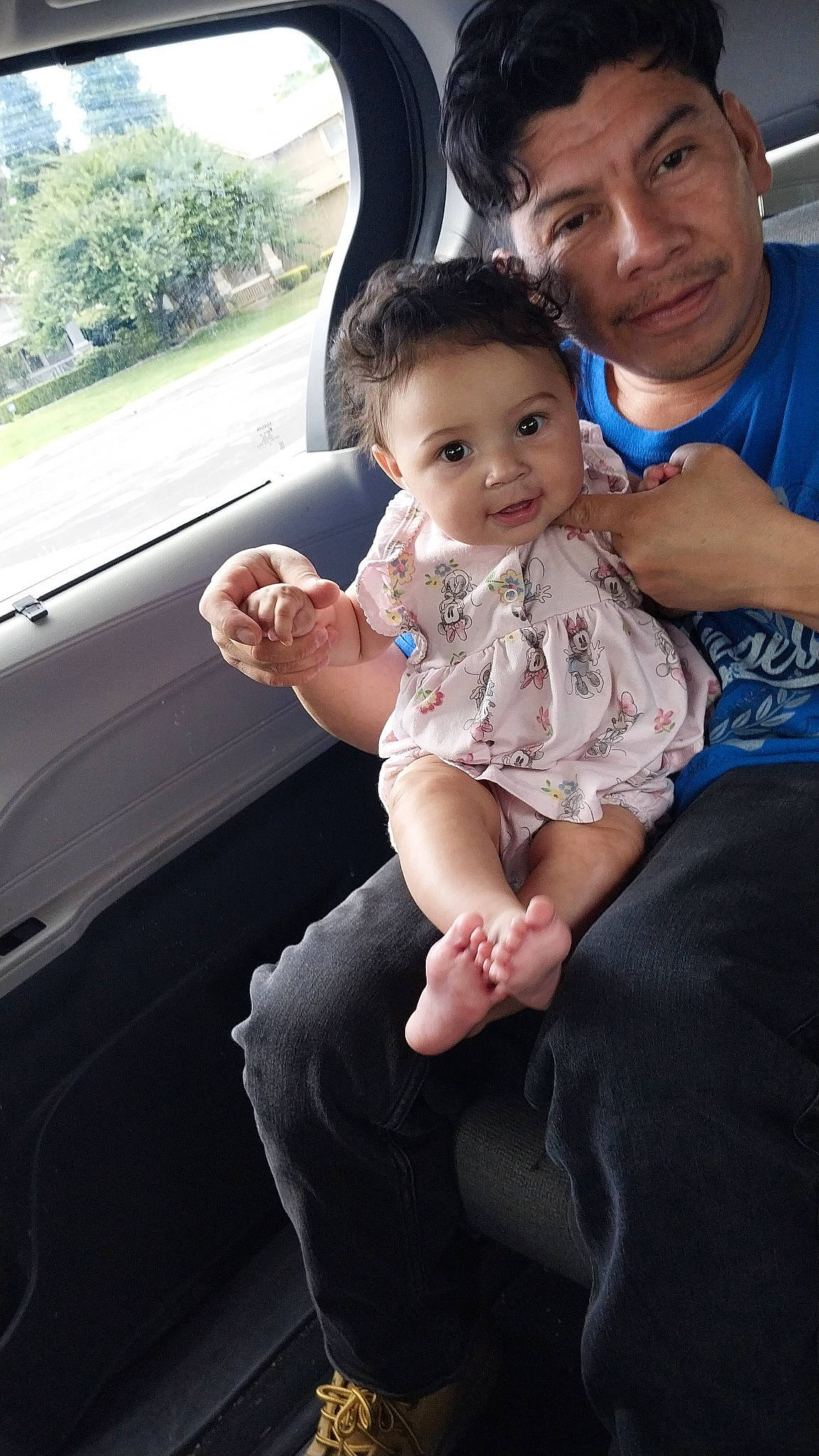 Ixchel joined the competition — help win amazing prizes! automotive_exterior, baby, baby_toddler_clothing, car, child, family_car, finger, fun, gesture, happy, lap, leg, motor_vehicle, person, sitting, skin, toddler, tree, vehicle_door, window