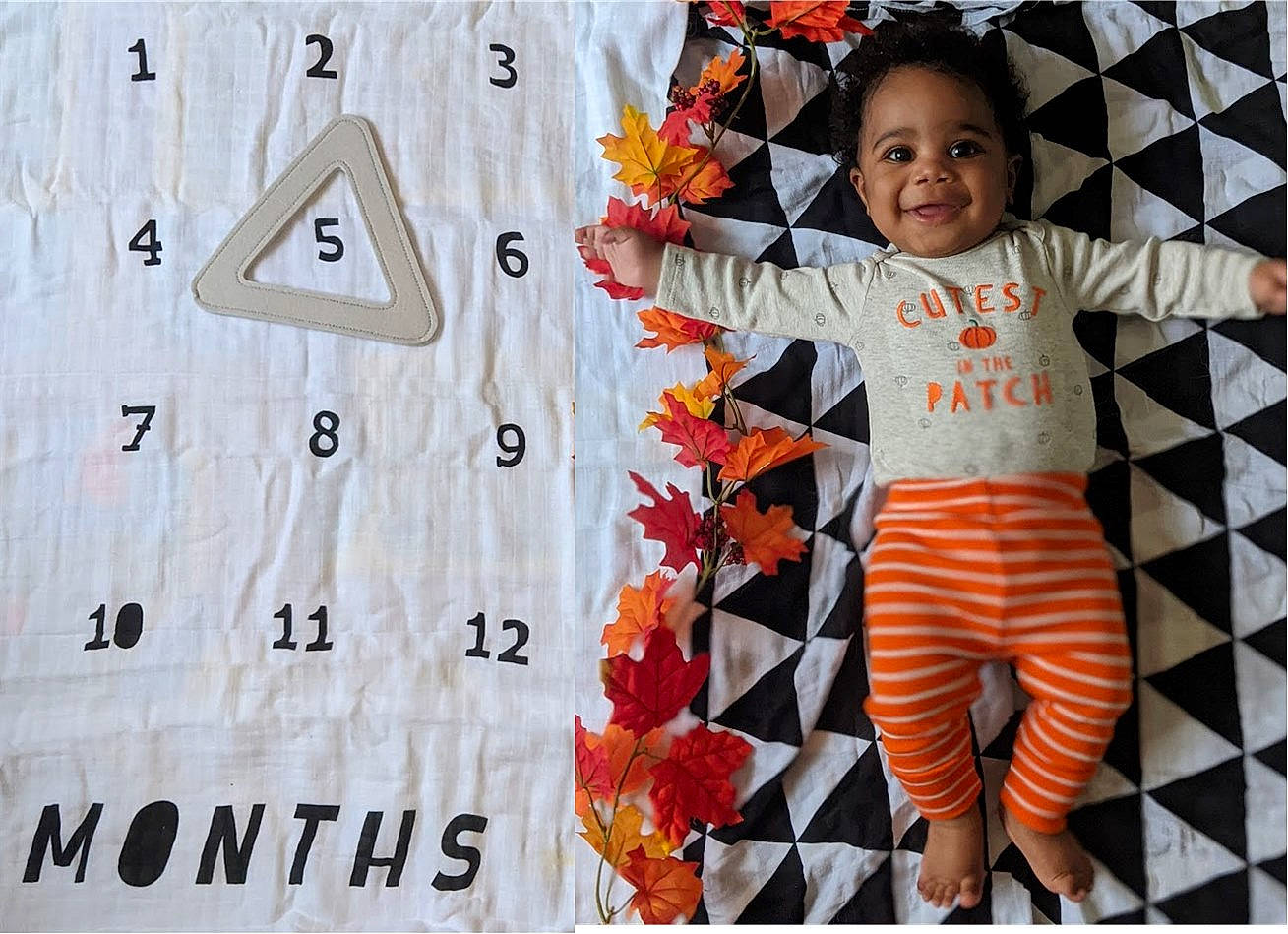 Maxwell is registered to the contest to win money with this photo: baby, baby_products, baby_toddler_clothing, joy, nightwear, orange, overall, pajamas, pattern, peach, person, textile, toddler