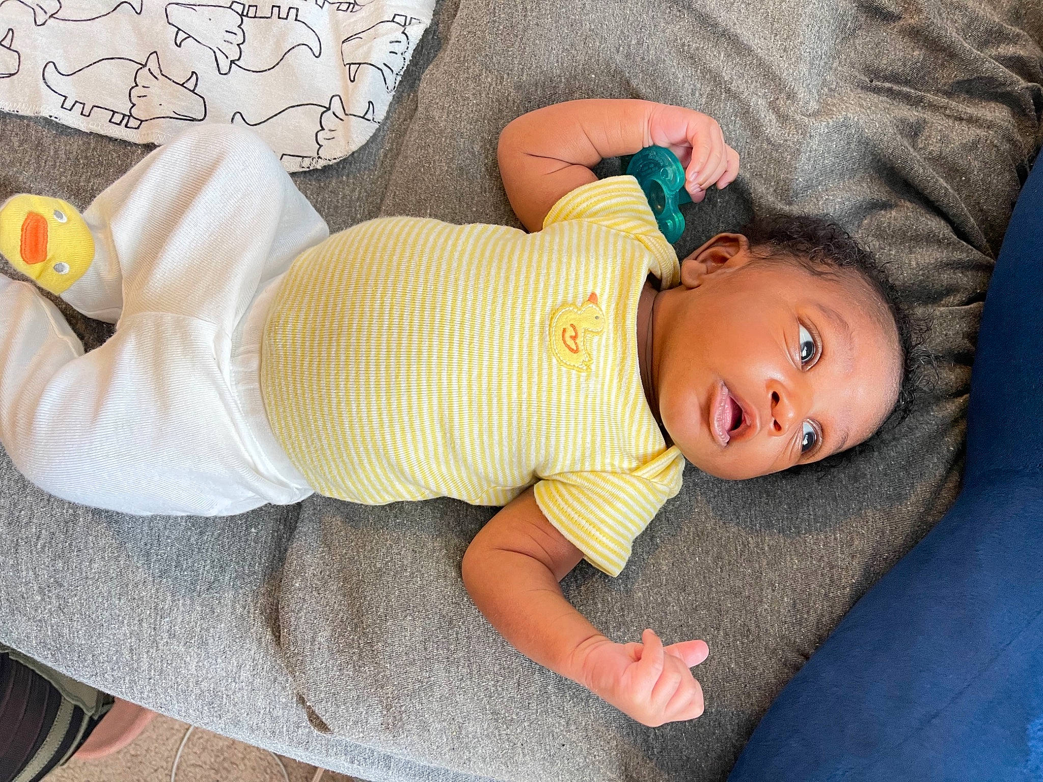 Aayden is registered to the contest to win money with this photo: baby, baby_sleeping, baby_toddler_clothing, child, comfort, finger, hat, human_body, human_leg, joint, knee, leg, linens, person, skin, sleeve, textile, thigh, toddler, vertebrate