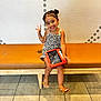 Sianny joined the competition — help win amazing prizes! child, girl, smiling, peace_sign, tablet, bench, sandals, brown_hair, hairstyle, wall_pattern, indoor, floor_tiles, casual_clothing, leopard_print, playful, happy, earrings, bracelet, modern_interior, sitting