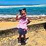 Sianny joined the competition — help win amazing prizes! child, girl, beach, ocean, sand, smile, happy, blue_sky, waves, hair_buns, pink_top, denim_skirt, sandals, sunny, outdoor, playful, pose, young, cute, accessories