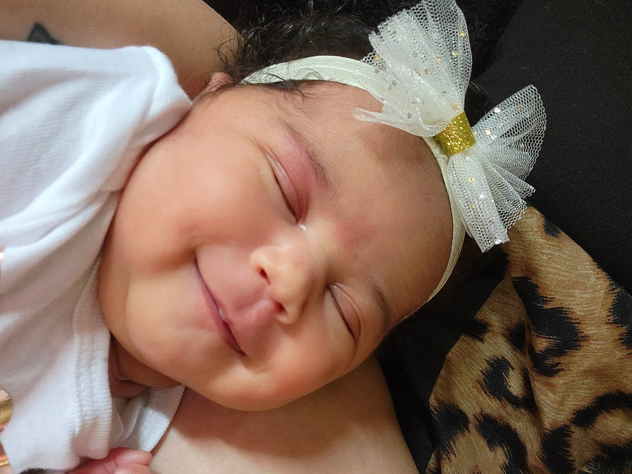 Kimorah is registered to the contest to win money with this photo: baby, baby_toddler_clothing, cheek, chin, eye, eyebrow, eyelash, finger, gesture, grass, hand, happy, head, headgear, headwear, iris, joy, lip, nose, person