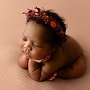 Jordyn joined the competition — help win amazing prizes! newborn, baby, sleeping, flower_crown, portrait, soft_light, closeup, peaceful, infant, skin, head, hands, resting, cute, adorable, studio, blanket, warm_colors, curly_hair, peace
