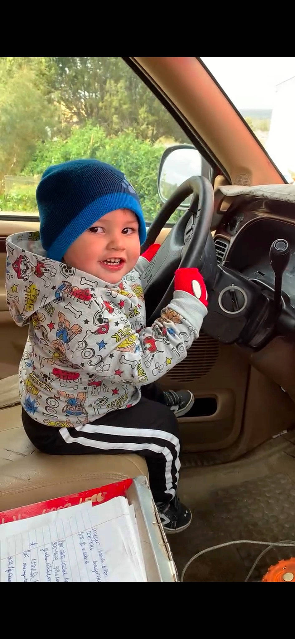 Thaddeus is registered to the contest to win money with this photo: automotive_design, automotive_exterior, automotive_mirror, automotive_wheel_system, baby, baby_toddler_clothing, cap, car, car_seat, child, headgear, headwear, motor_vehicle, outerwear, person, plant, steering_part, steering_wheel, toddler, tree