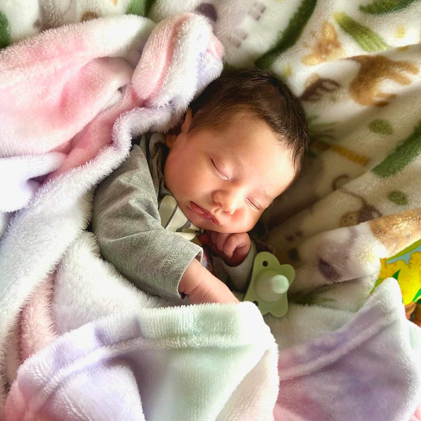 Kenzley joined the competition — help win amazing prizes! baby, bed, blanket, child, clothing, comfort, cozy, cute, face, indoors, infant, newborn, pacifier, peaceful, portrait, rest, sleeping, soft, toddler, warm