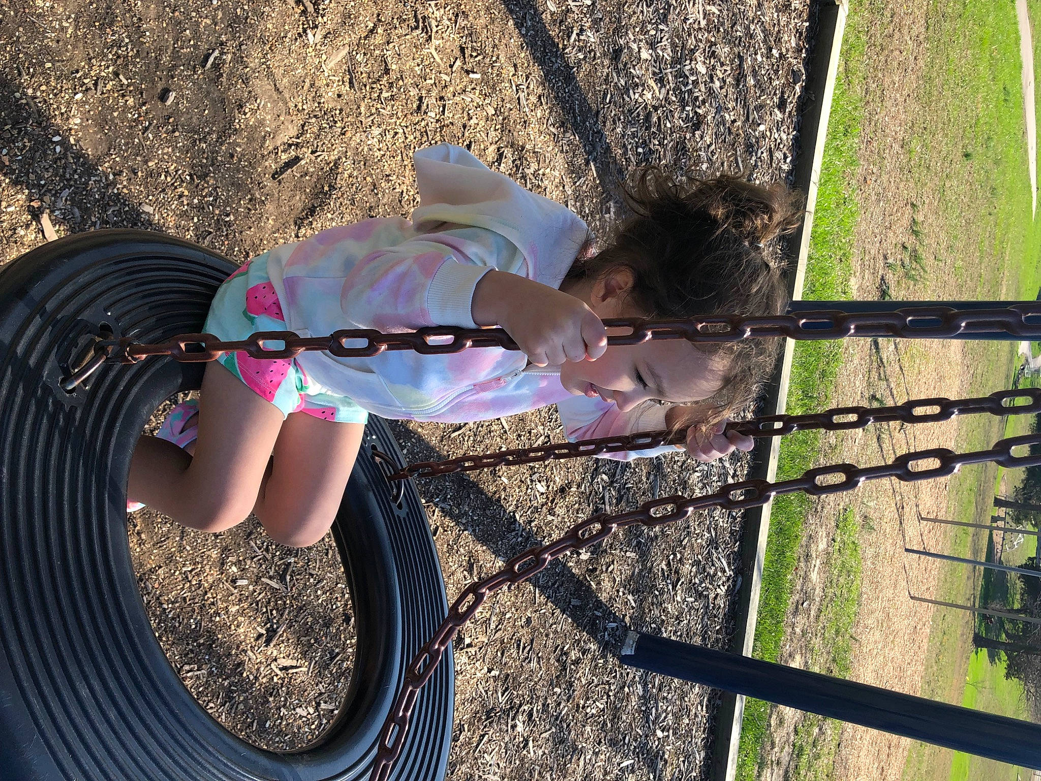 Kya joined the competition — help win amazing prizes! automotive_tire, automotive_wheel_system, baby, child, electric_blue, fun, grass, human_leg, leisure, magenta, people_in_nature, person, recreation, shadow, sitting, soil, spring, thigh, tints_and_shades, toddler