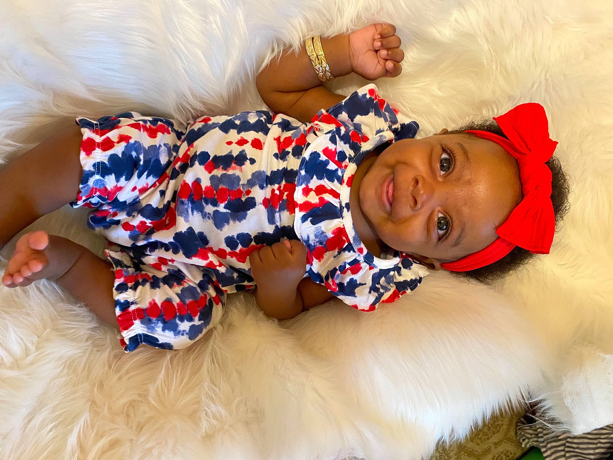 Kaiah joined the competition — help win amazing prizes! abdomen, arm, baby_toddler_clothing, child, comfort, event, finger, happy, human_leg, knee, nail, pattern, person, red, sleeve, smile, textile, thigh, toddler, white