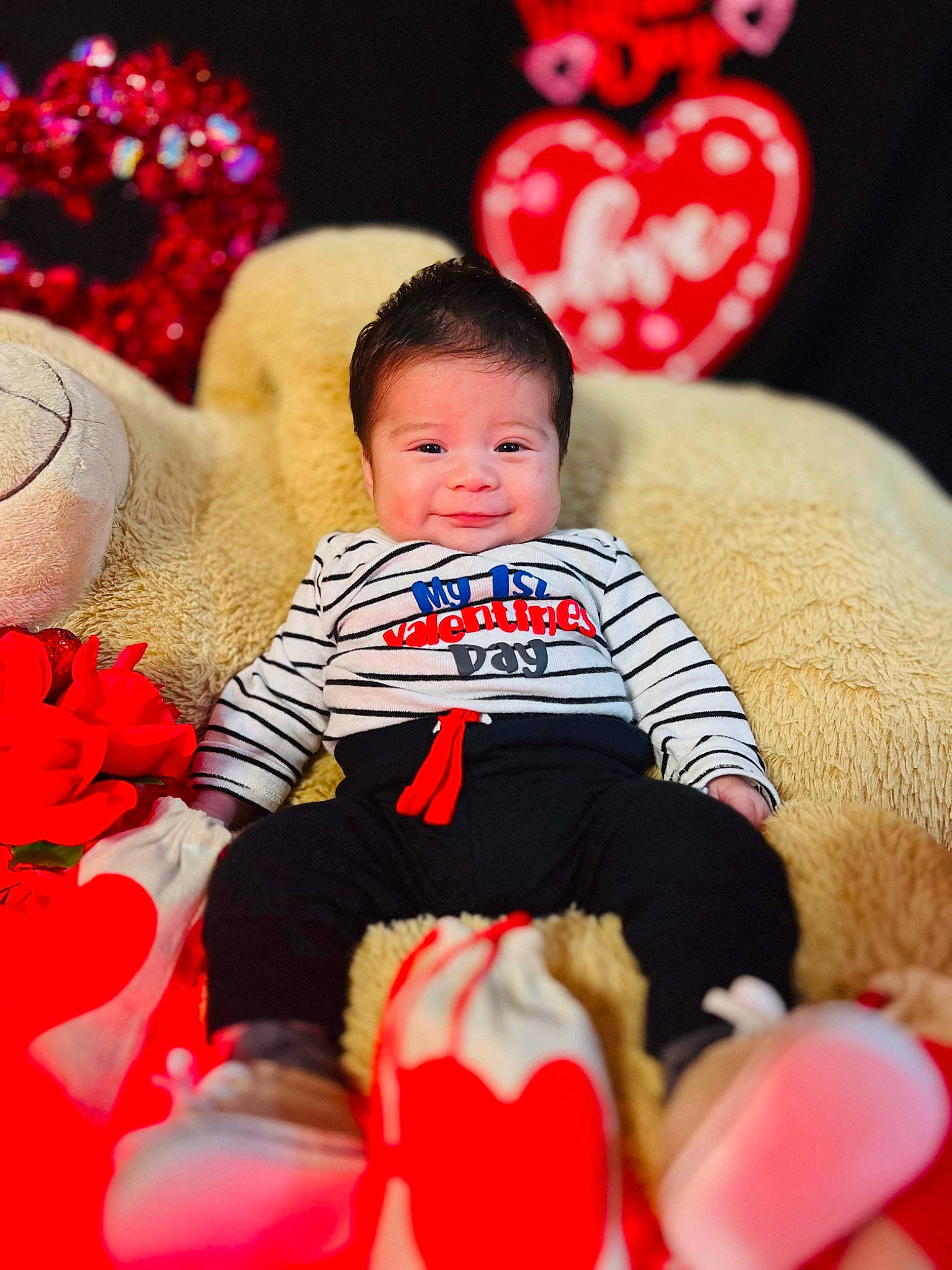 Giancarlo joined the competition — help win amazing prizes! baby, baby_toddler_clothing, child, christmas, christmas_eve, event, facial_expression, fun, fur, happy, holiday, human_body, mammal, organ, person, pink, playing_with_kids, red, sitting, teddy_bear