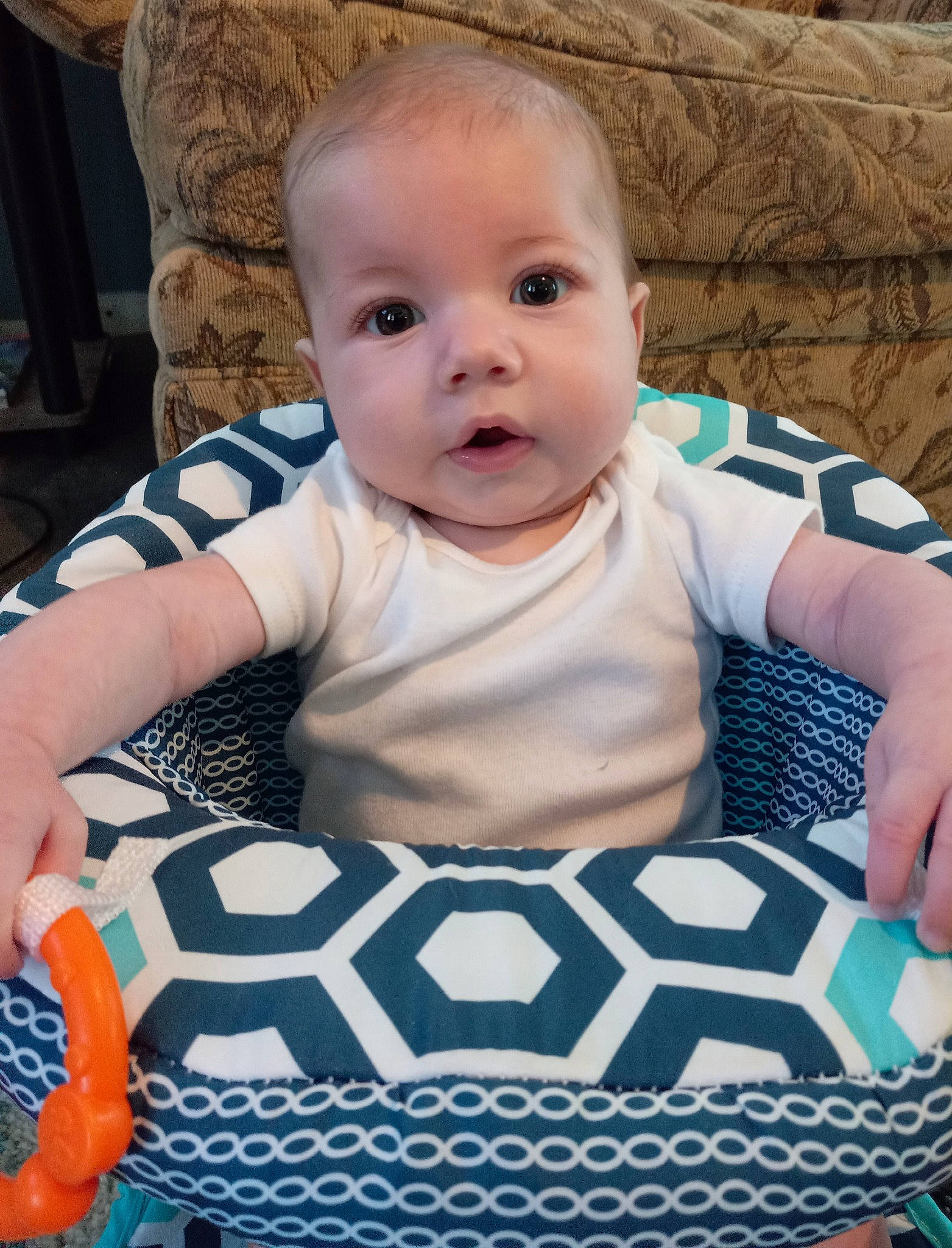 Edison is registered to the contest to win money with this photo: baby, baby_toddler_clothing, black, cheek, child, cool, dress, eye, facial_expression, flash_photography, hairstyle, happy, human, iris, mammal, person, skin, sleeve, standing, toddler