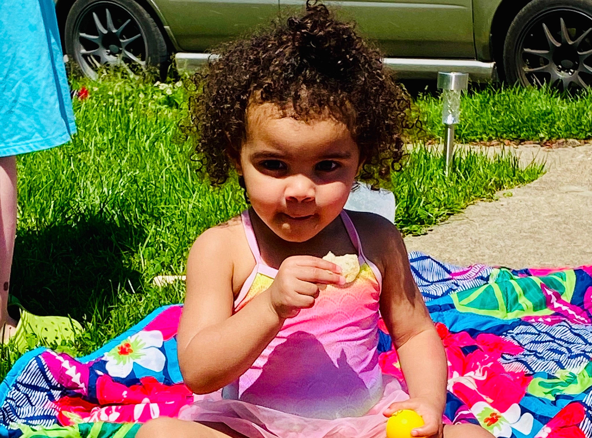 Malia is registered to the contest to win money with this photo: child, fun, games, grass, happy, leisure, party, person, picnic, plant, play, recreation, sitting, summer, toddler, vacation