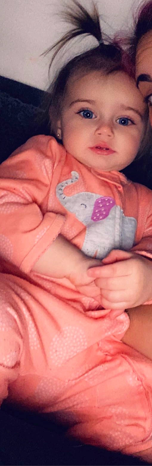 Madalynn is registered to the contest to win money with this photo: baby, cheek, child, chin, close_up, eye, face, finger, hand, head, lip, mouth, muscle, neck, nose, person, pink, skin, smile, thumb