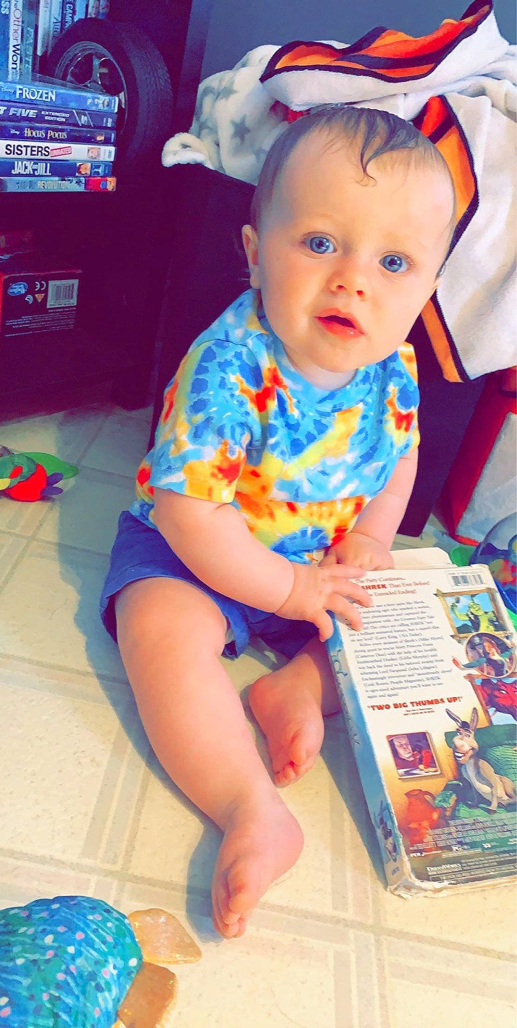 Landyn is registered to the contest to win money with this photo: baby, child, leg, person, play, reading, sitting, skin, surprise, toddler