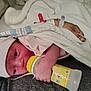 Jordan joined the competition — help win amazing prizes! baby, newborn, infant, bottle, feeding, blanket, hat, hand, hospital, person, clothing, bed, sleepwear, rest, comfort, cute, skin, face, sleeve, lying