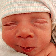 Jordan joined the competition — help win amazing prizes! newborn, baby, sleeping, hat, close_up, infant, face, skin, blanket, peaceful, cute, soft, wrapped, child, portrait, headwear, tender, tiny, resting, newborn_baby