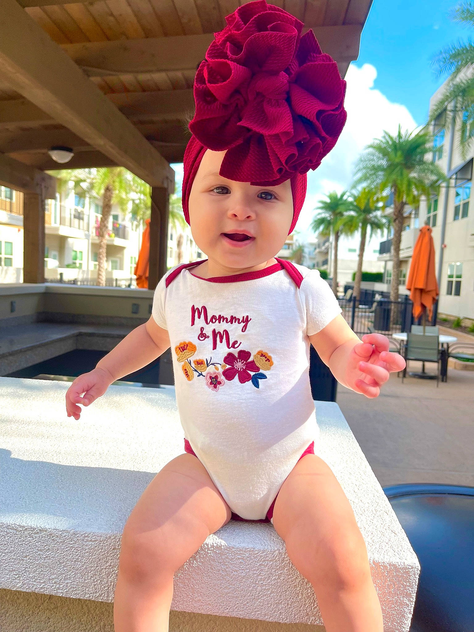Adalynn Luera is registered to the contest to win money with this photo: cap, costume_hat, fashion_accessory, fun, happy, hat, headgear, headwear, human_leg, leisure, person, pink, recreation, red, snapshot, sportswear, sun_hat, swimwear, thigh, toddler