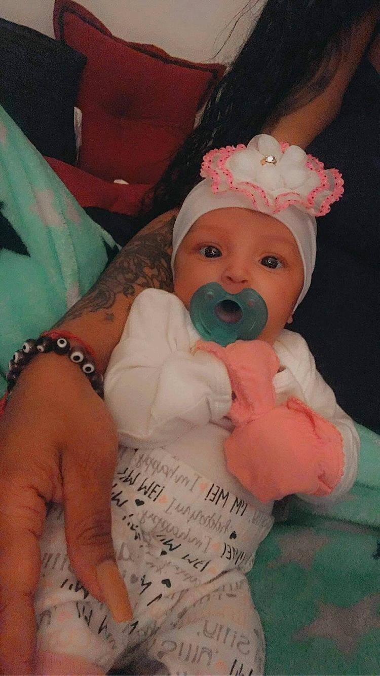 Celiany is registered to the contest to win money with this photo: arm, baby, baby_toddler_clothing, cheek, chest, child, comfort, event, finger, fun, hand, happy, hat, headwear, jewellery, mouth, nose, person, pink, skin