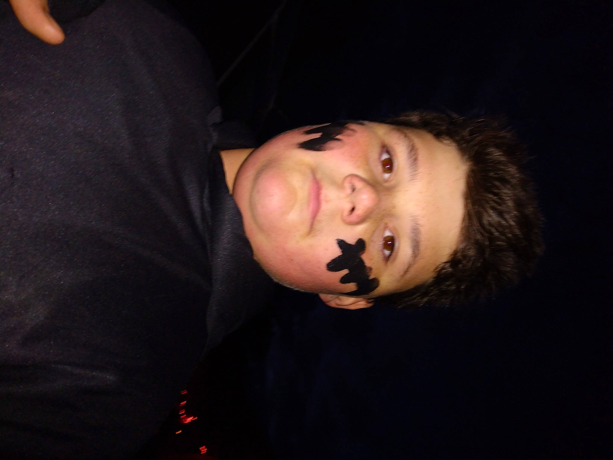 Elijah is registered to the contest to win money with this photo: cheek, chin, darkness, ear, elbow, event, eyelash, facial_hair, flash_photography, fun, jaw, midnight, neck, nose, person, sleeve, t_shirt, throat